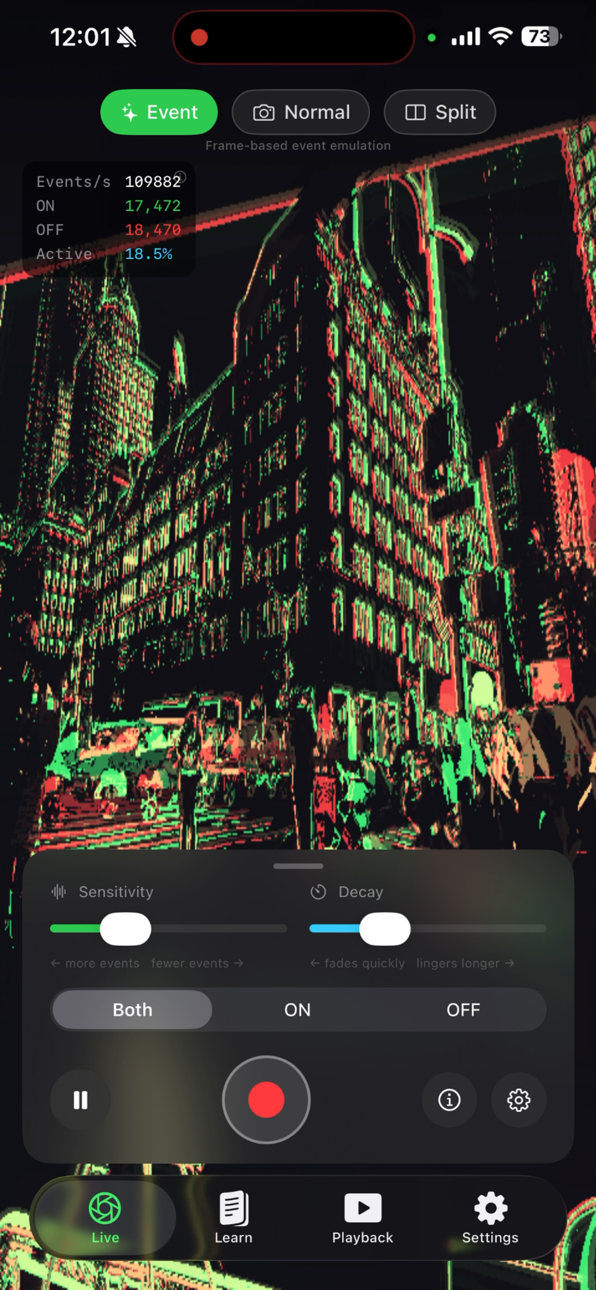EventScope Vision in Event mode: a city street rendered as green and red event sparks against black, with an events-per-second metrics overlay, Sensitivity and Decay sliders, a Both/ON/OFF toggle, record controls, and a Live/Learn/Playback/Settings tab bar.